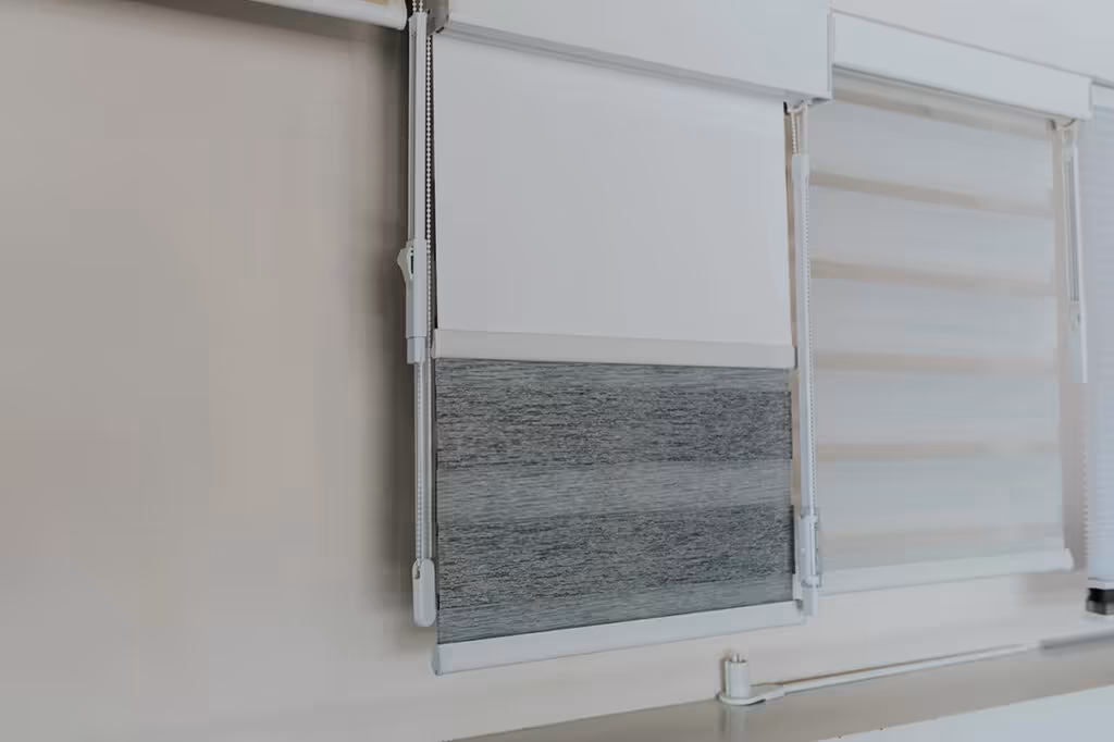 Dual fabric shades in an Edmonton bedroom configured for night blackout