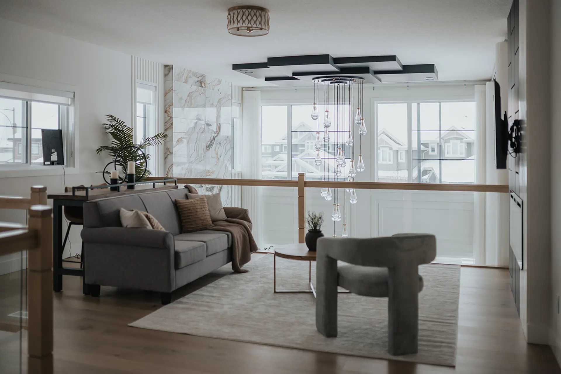 Custom blinds and curtains installed in an Edmonton home by Novo Blinds — full room view of finished window coverings