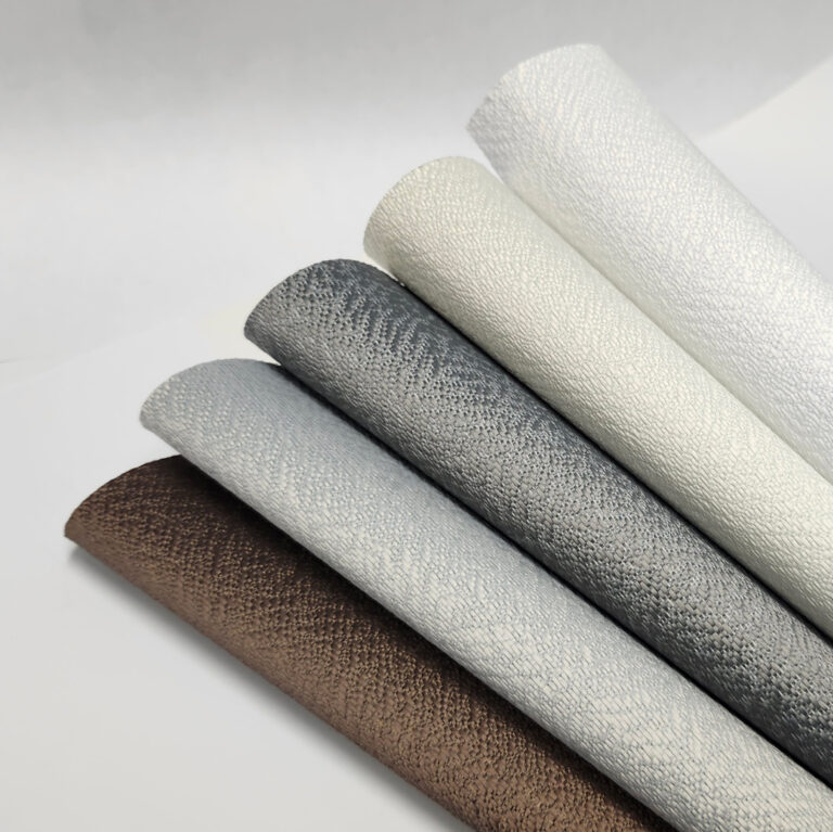 Warm fabric swatches in the 2026 blind colour palette — sand, brown, and warm neutral tones