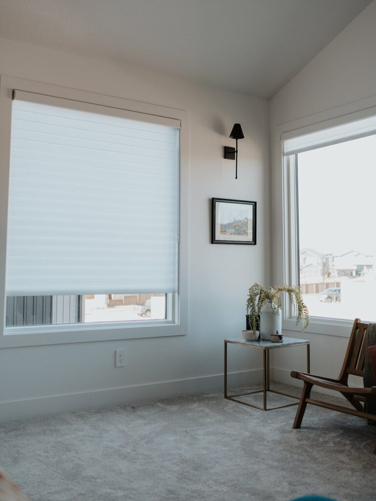 Sherwood Park bedroom with custom blackout roller shades, Edmonton residential blinds gallery