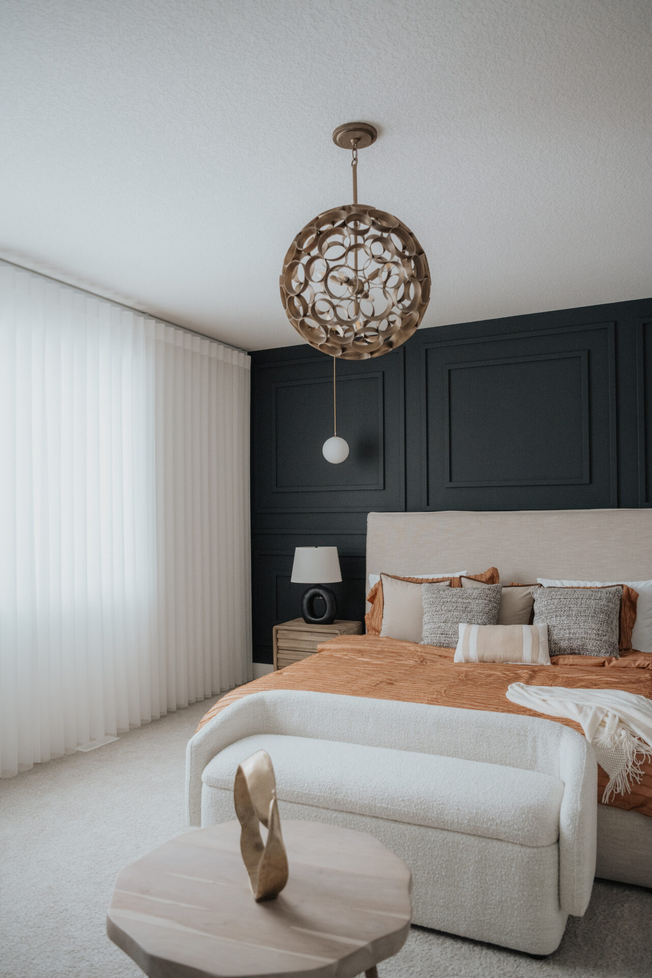 Cozy residential bedroom featuring custom roller blinds from our Edmonton gallery