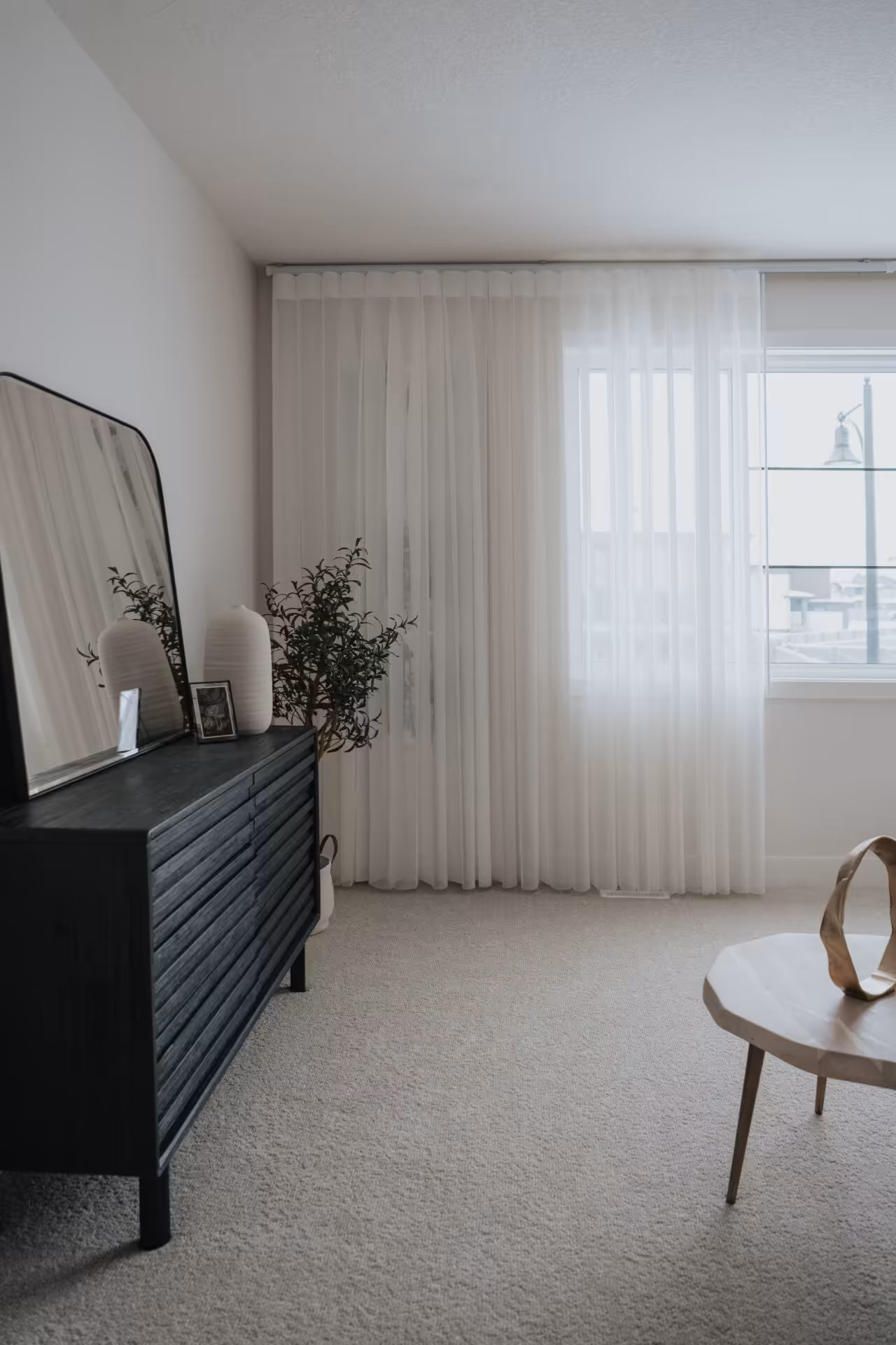 Custom window coverings in Edmonton home — dark bedroom accents blinds edmonton residential