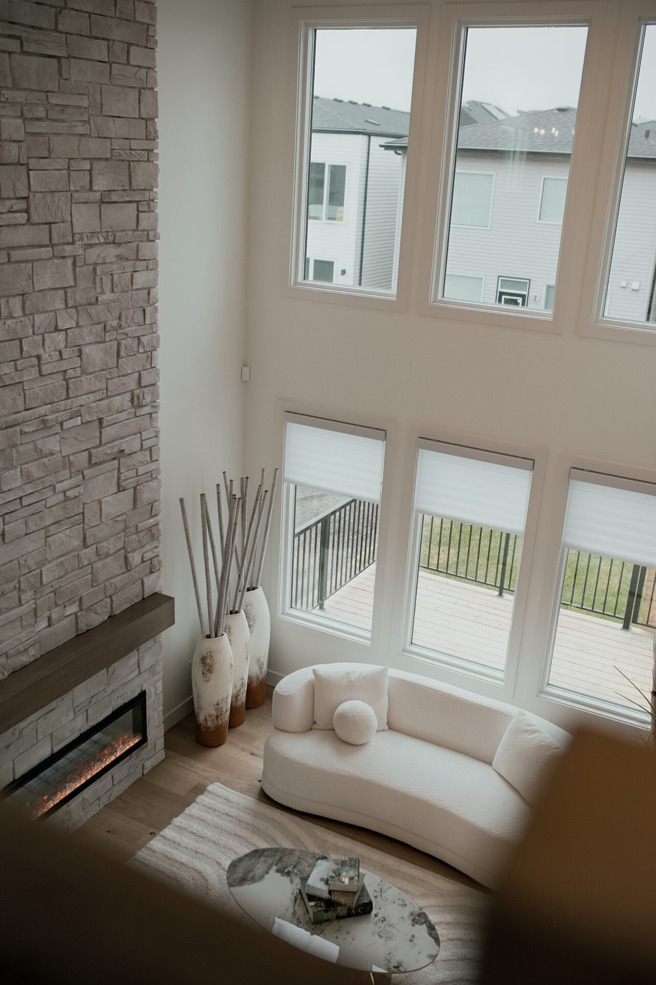 Residential blinds gallery showcasing sheer shades and roller blinds for floor-to-ceiling areas