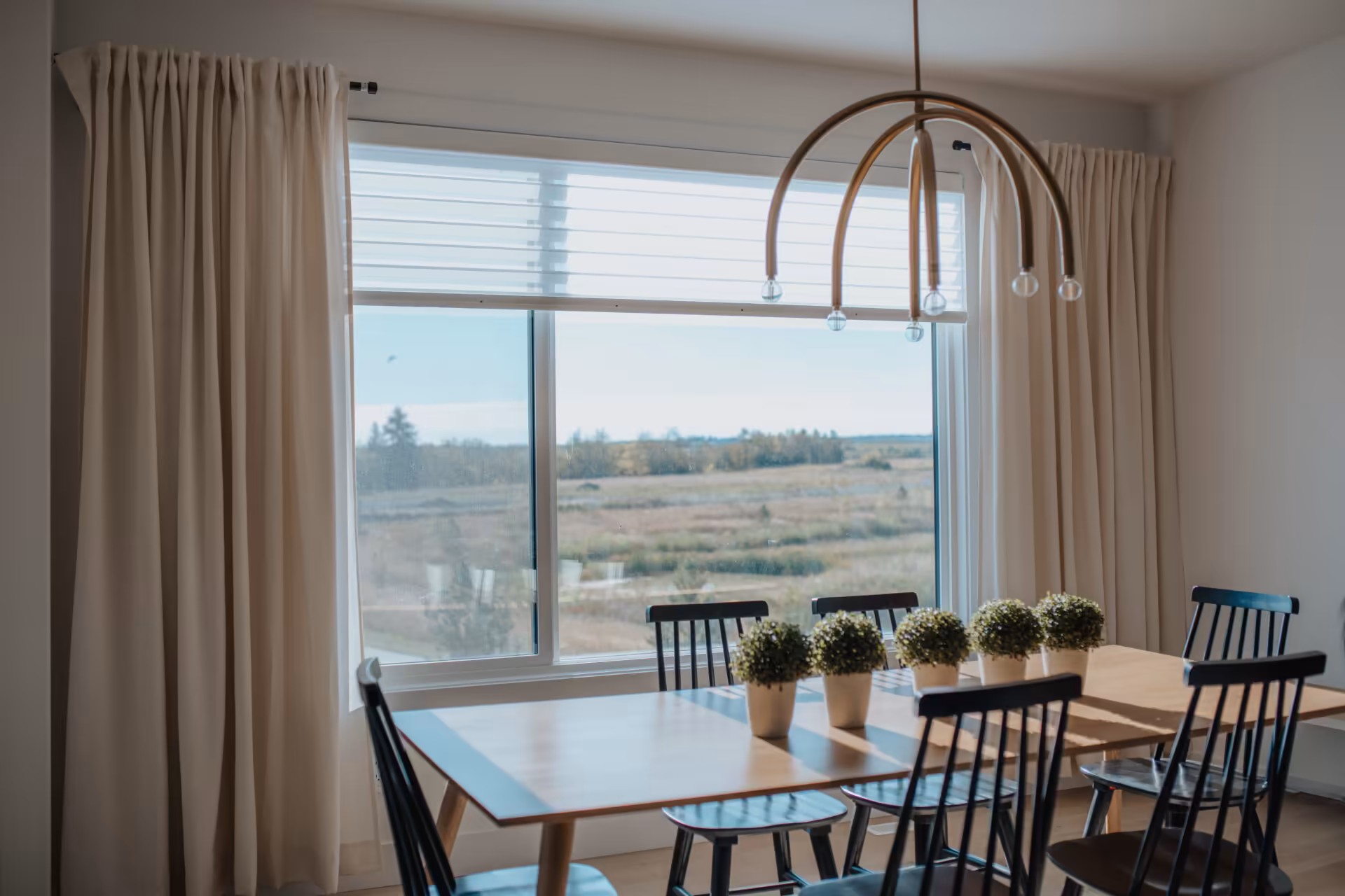 Blinds on panoramic floor-to-ceiling windows