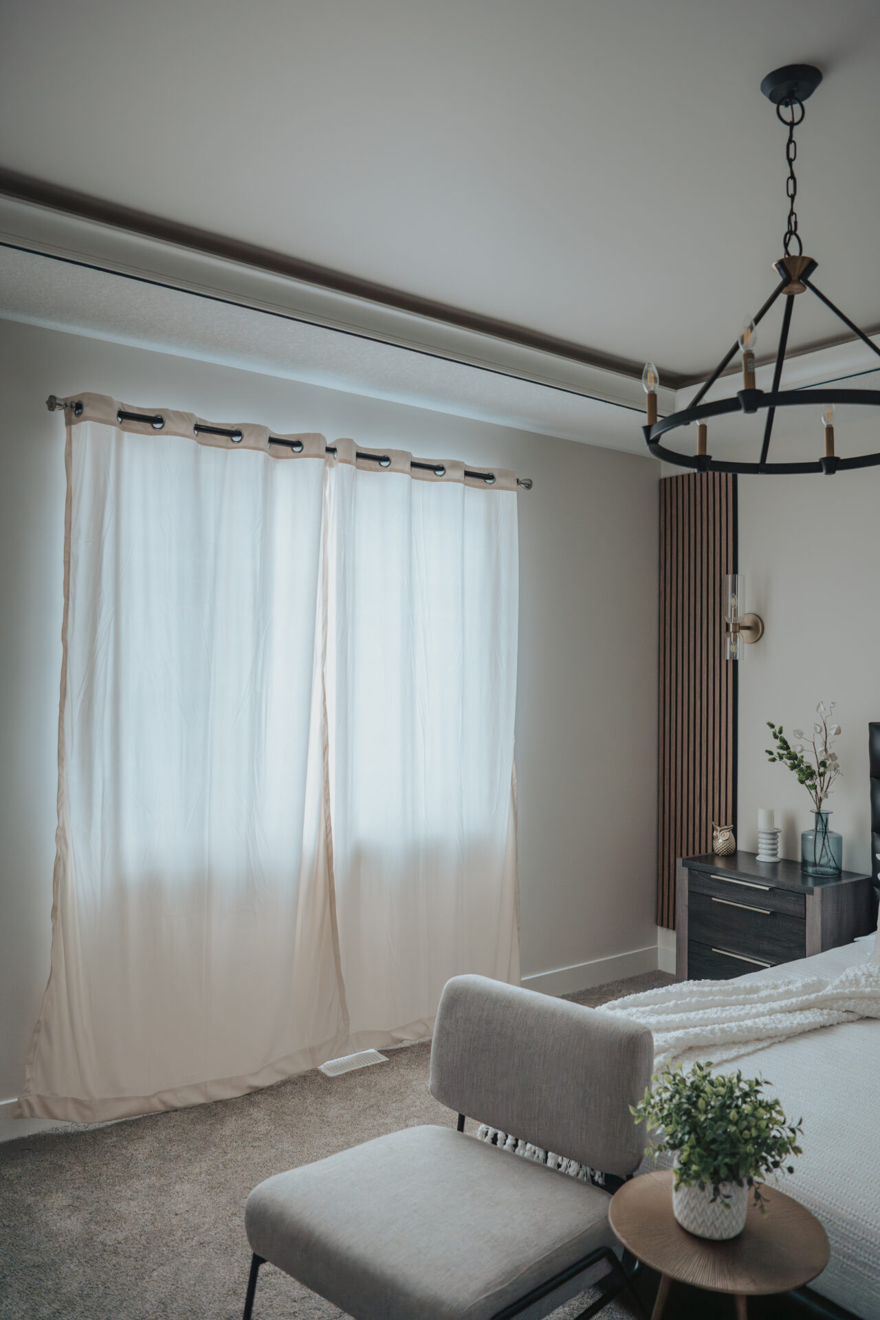 Elegant residential sheer curtains and blinds combination in an Edmonton home