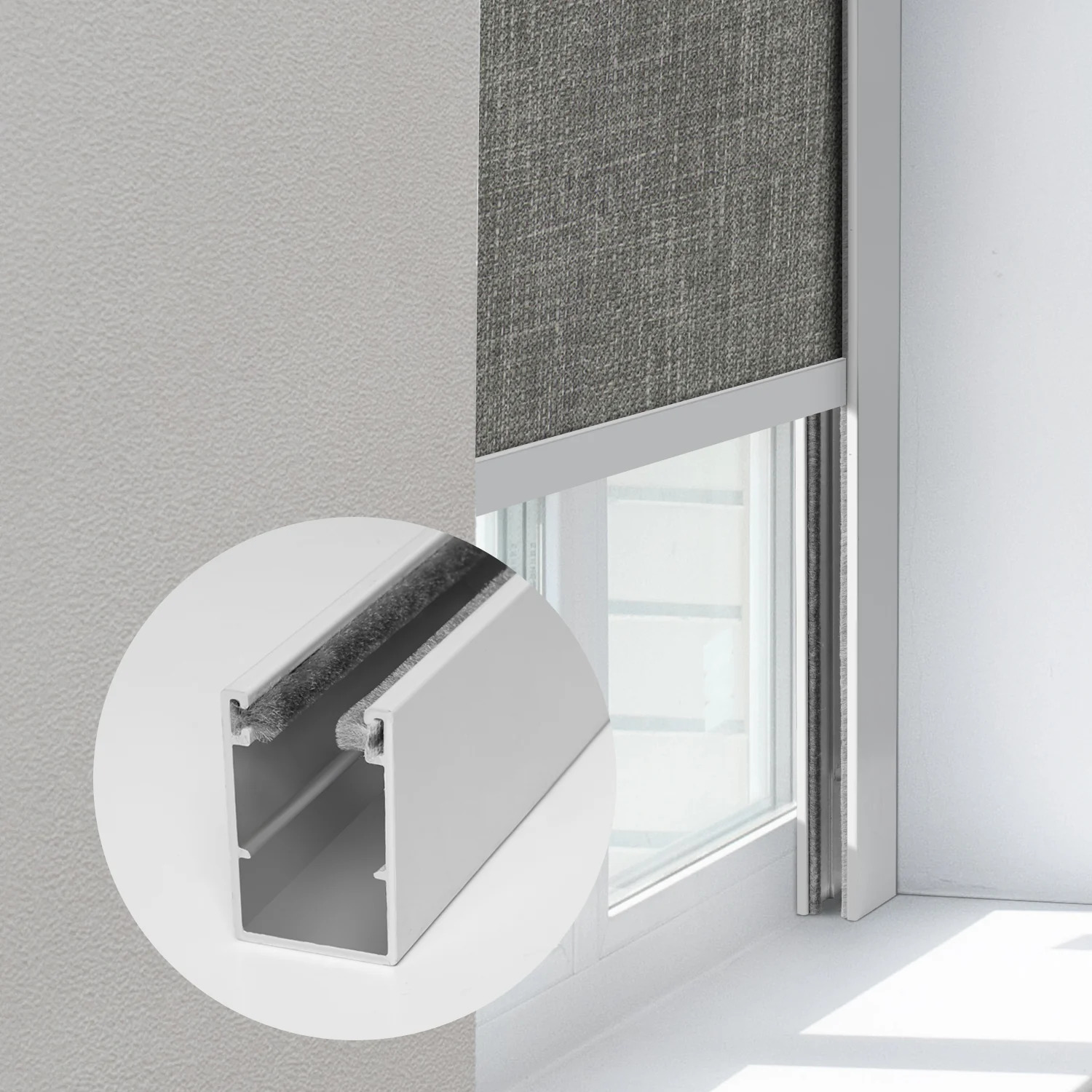 Cutaway detail of Novo aluminum side channel showing the felt-lined groove that grips the blackout fabric edge