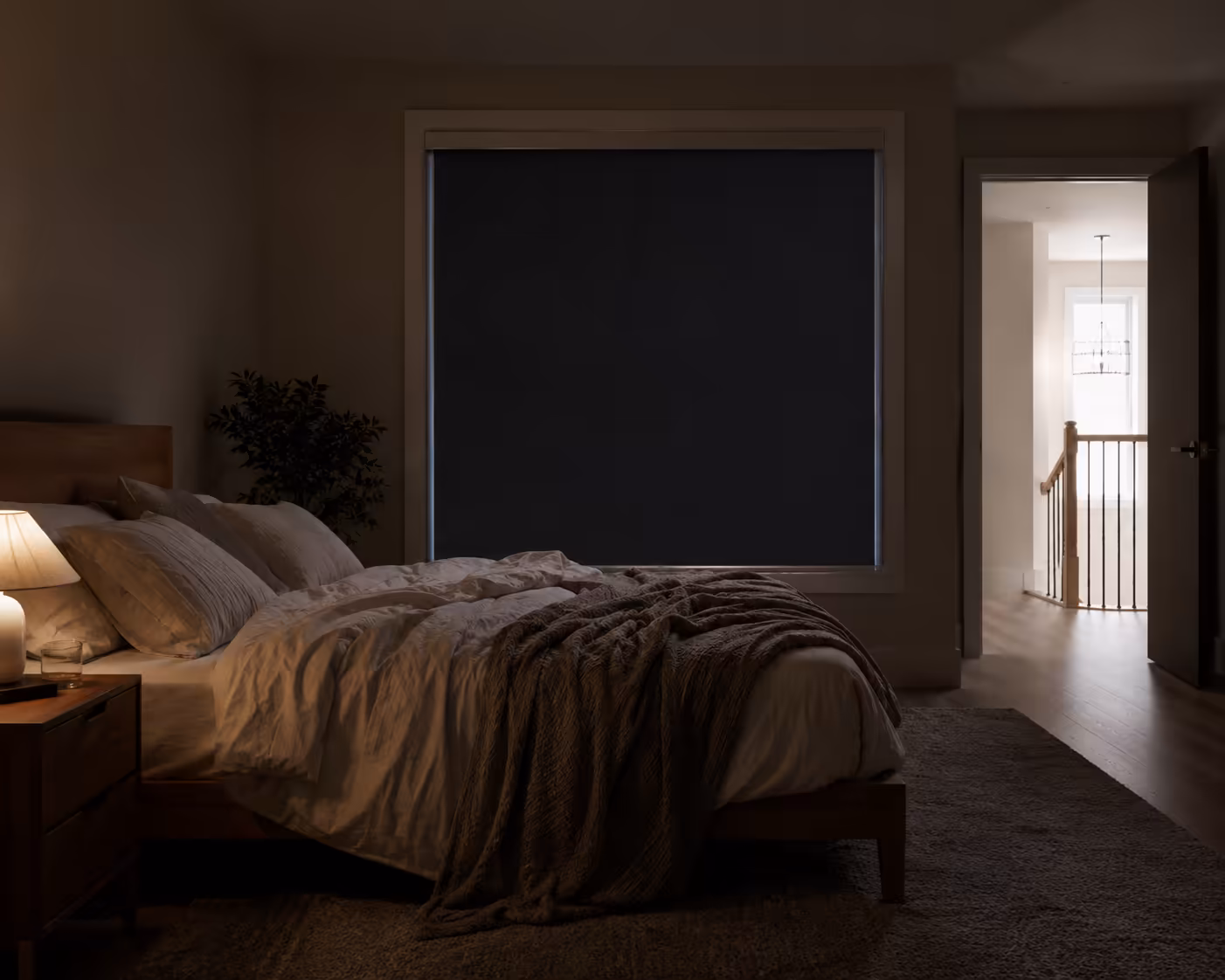 Custom window coverings in Edmonton home — blackout shift worker bedroom novoblinds
