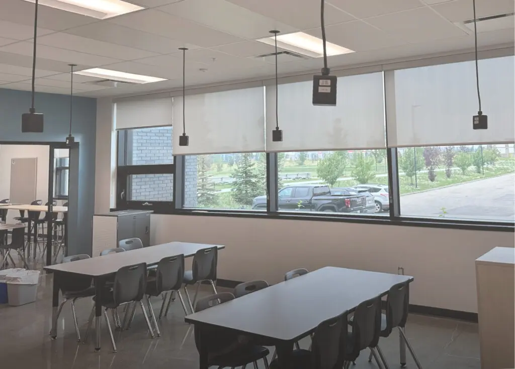 Commercial Edmonton window blinds roller shades installed in office space